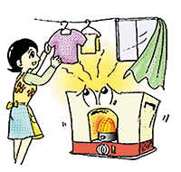 暖房器具による火災を防ぐために　ストーブの上に洗濯物は干さない