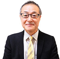 同商店街振興組合理事長　堀川　雅弘さん　近影