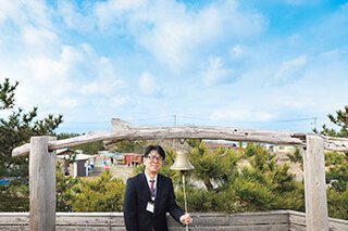 北区長　丸山　寛　の顔写真