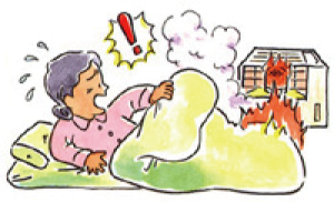 ストーブからふとんに引火した写真